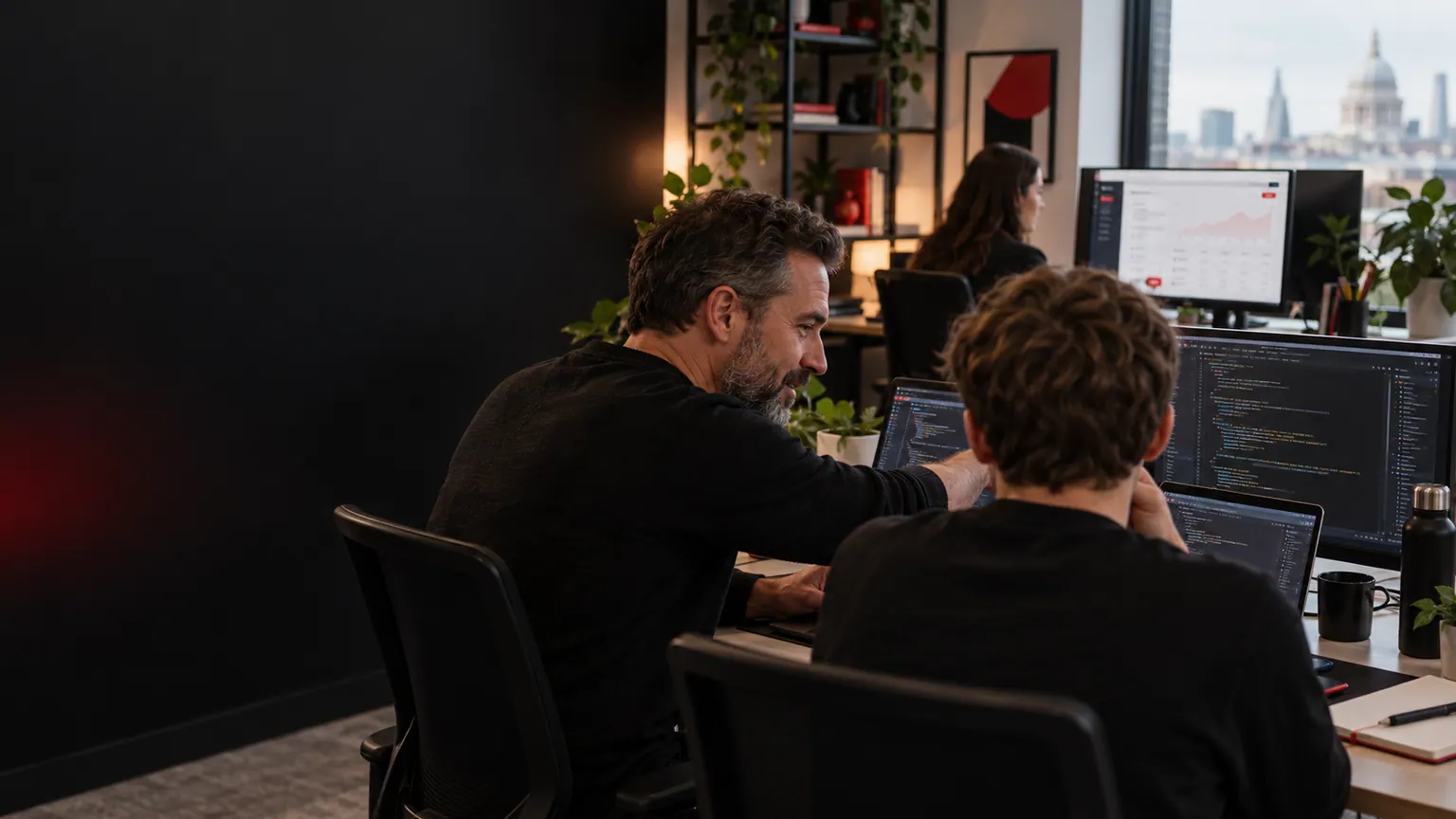 Software engineers collaborating and learning together